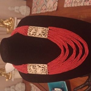 Necklace possibly African hand made beaded. Red and ivory color